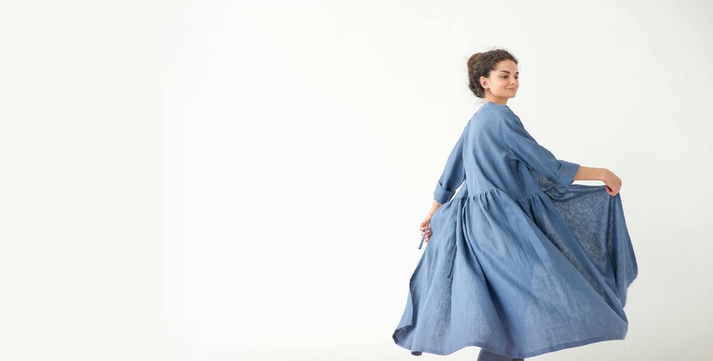 Woman wearing a denim blue linen dress